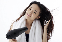 Drying hair with a blowdryer